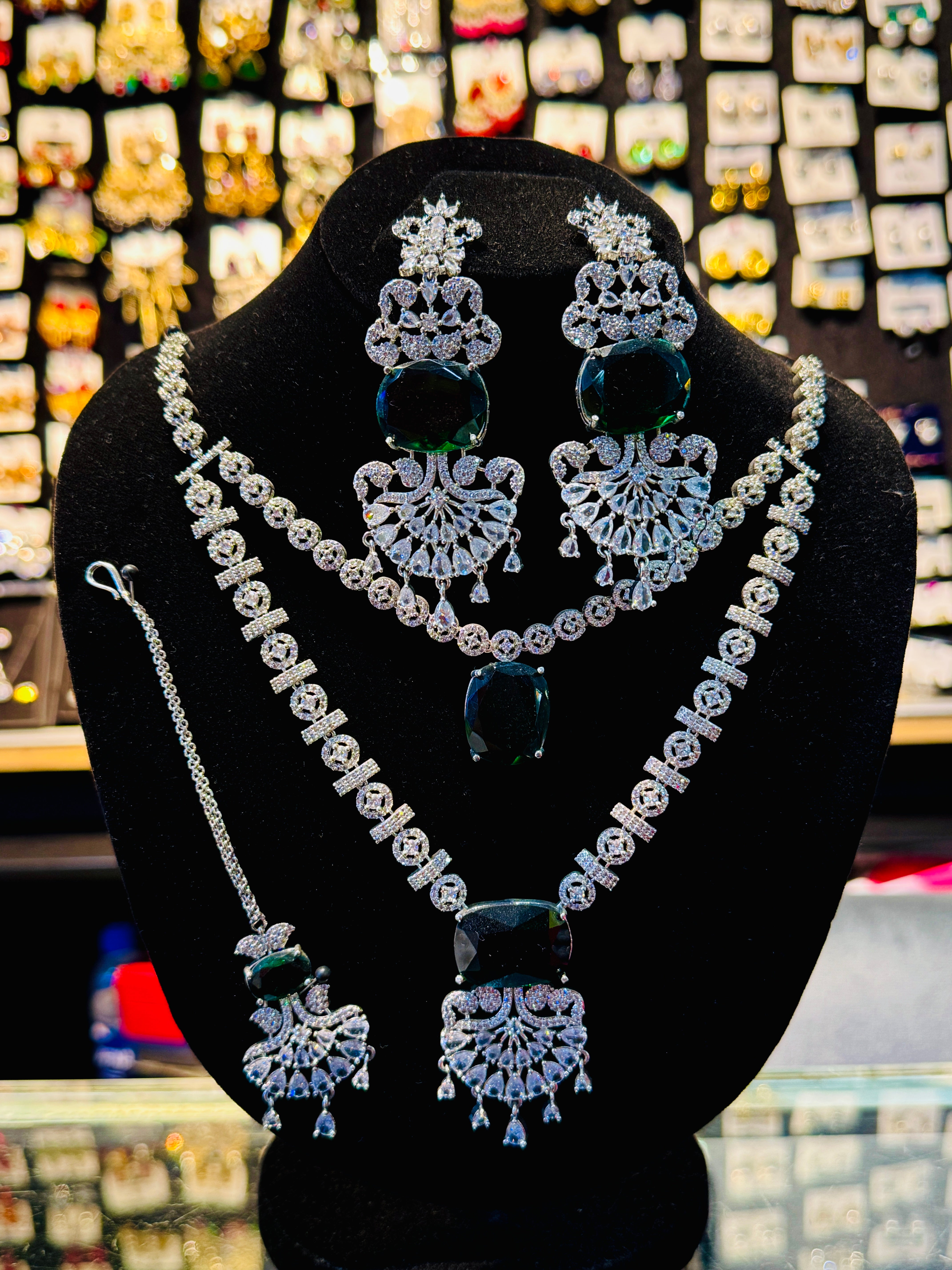 Premium Silver-Plated Bridal Set with Green Stones – Complete Necklace, Earrings & Tikka