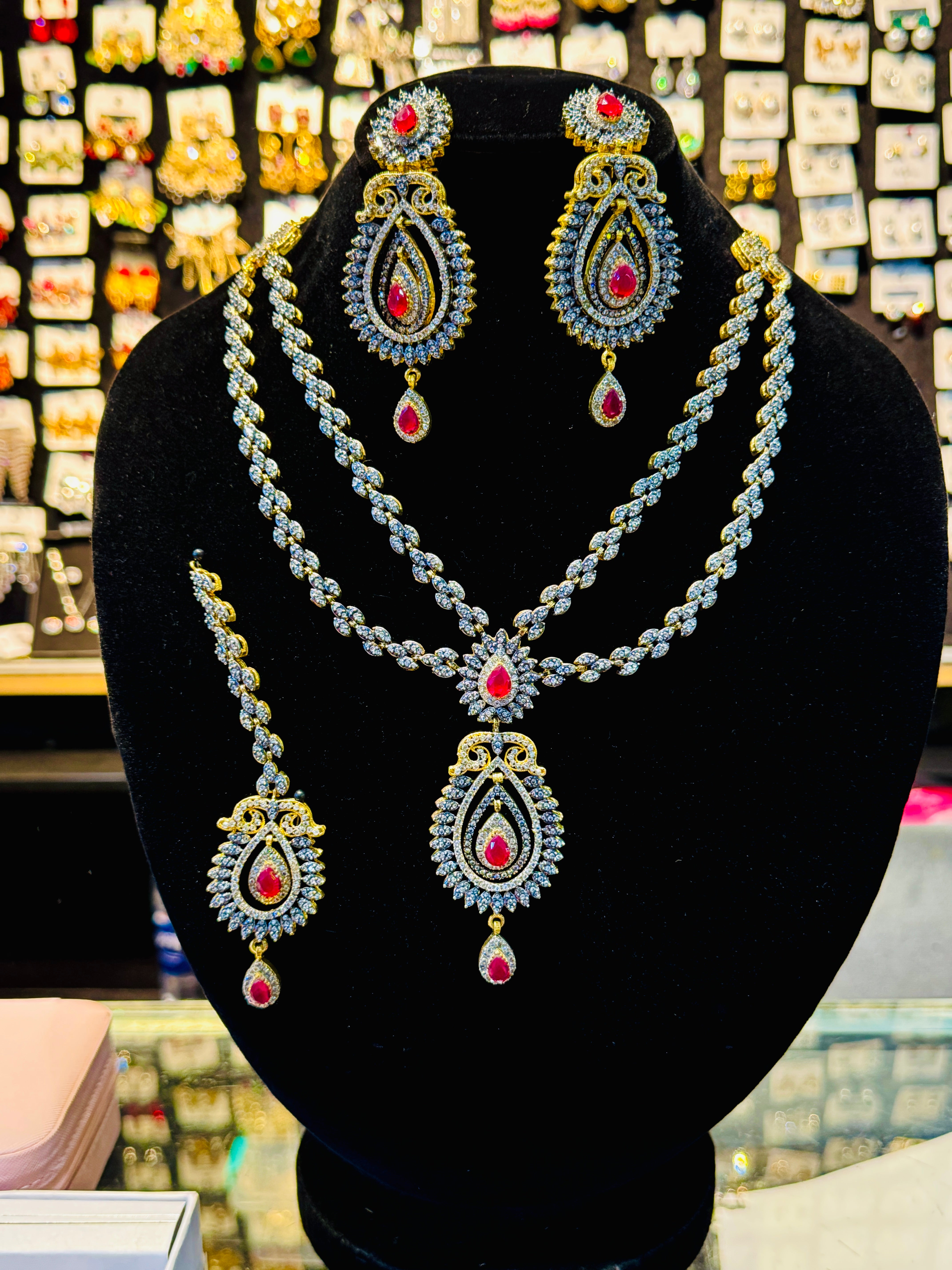 Royal Gold-Plated Red Stone Bridal Set – Double-Layer Necklace, Earrings & Tikka