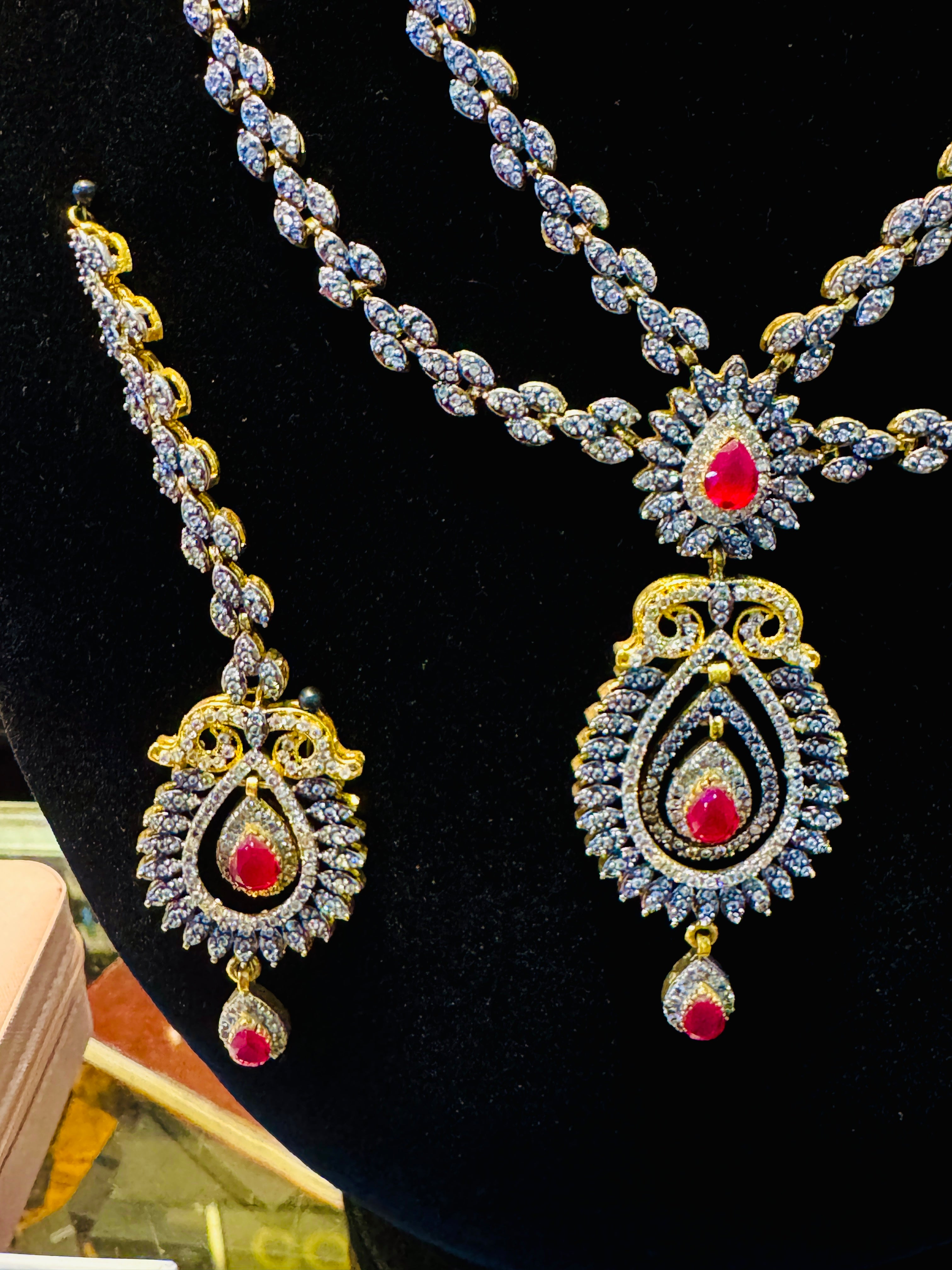 Royal Gold-Plated Red Stone Bridal Set – Double-Layer Necklace, Earrings & Tikka