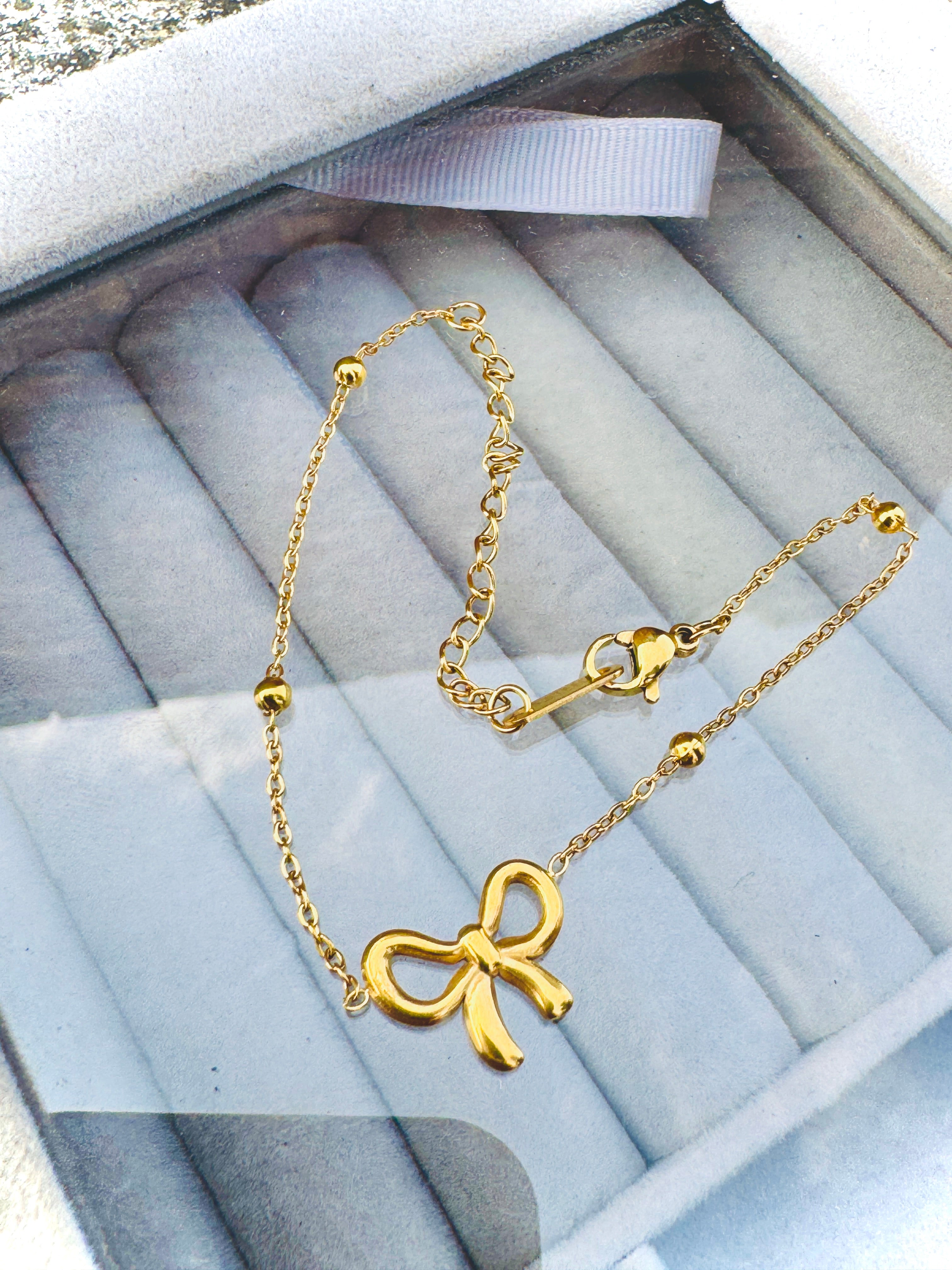Charming Gold-Plated Bow Bracelet – Elegant & Feminine Daily Wear